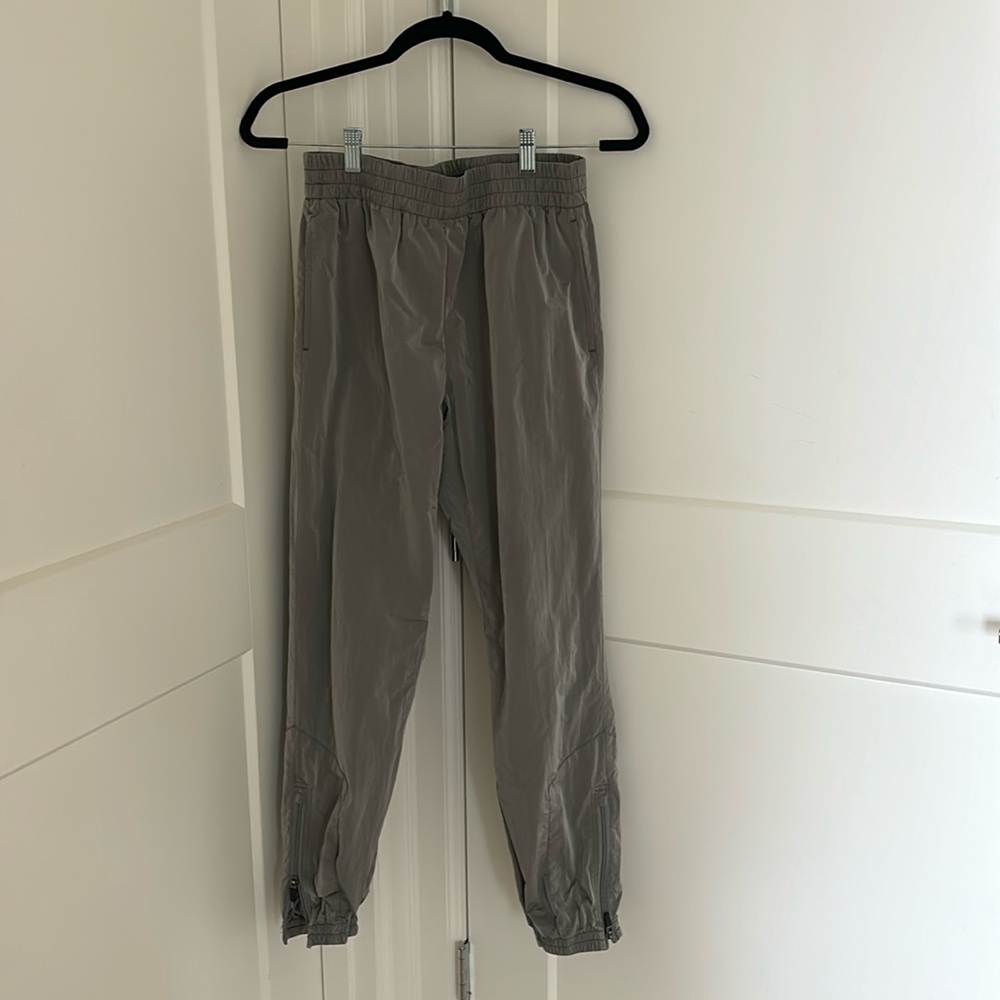 Aritzia TNA reflective gray silver track pants Size Small